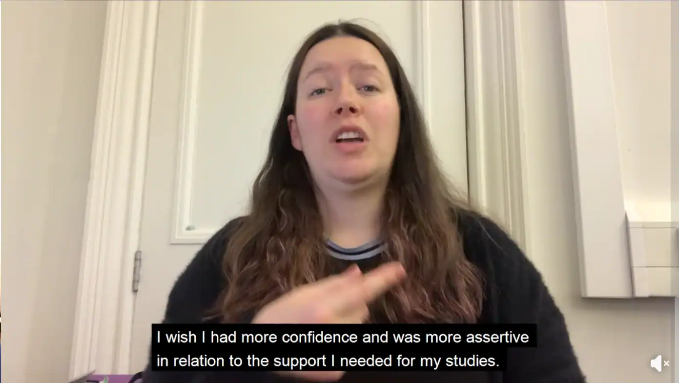 Deaf woman signing and speaking about BSL (Scotland) Act 2015.